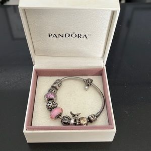 Pandora bracelet 11 charms like new Measures 9”